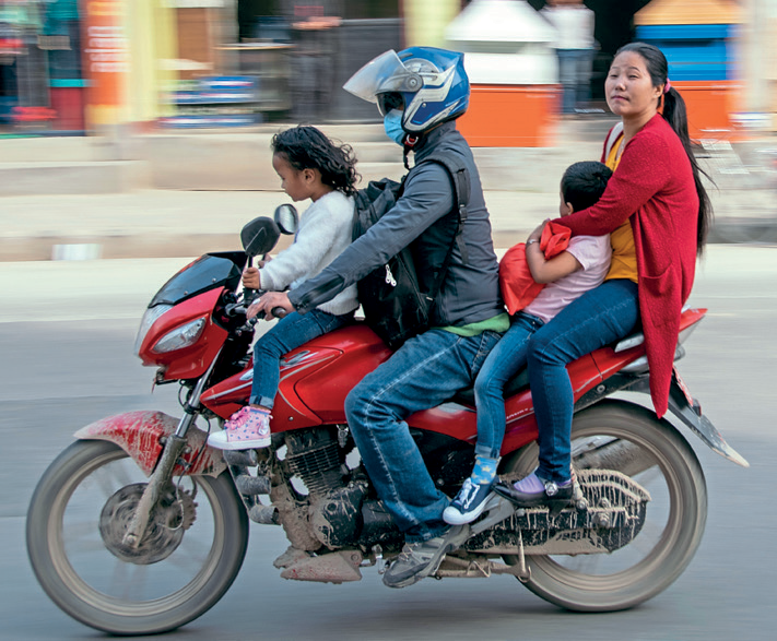 Dec 20_IAM training riders in Nepal_Family on bike