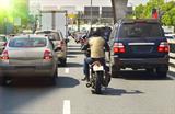 Motorbike filtering traffic
